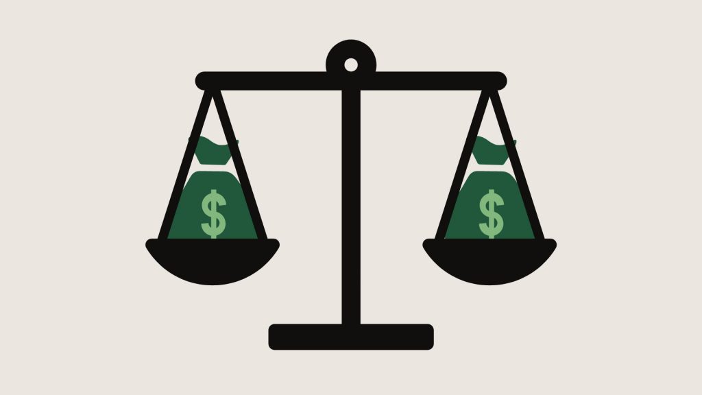 A black balance scale holds two green money bags, each with a dollar sign, one on each side. The scale appears evenly balanced. The background is light beige.
